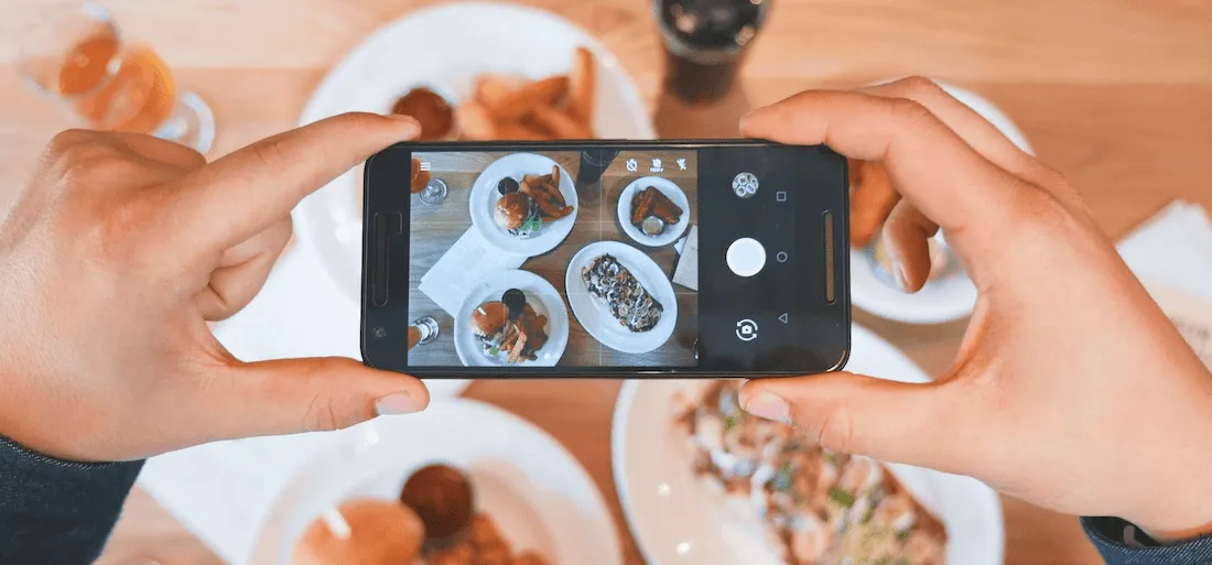 Person snapping food - Photo by Eaters Collective on Unsplash