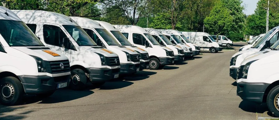 Photo of a fleet of delivery vehicles to help describe what is fleet management