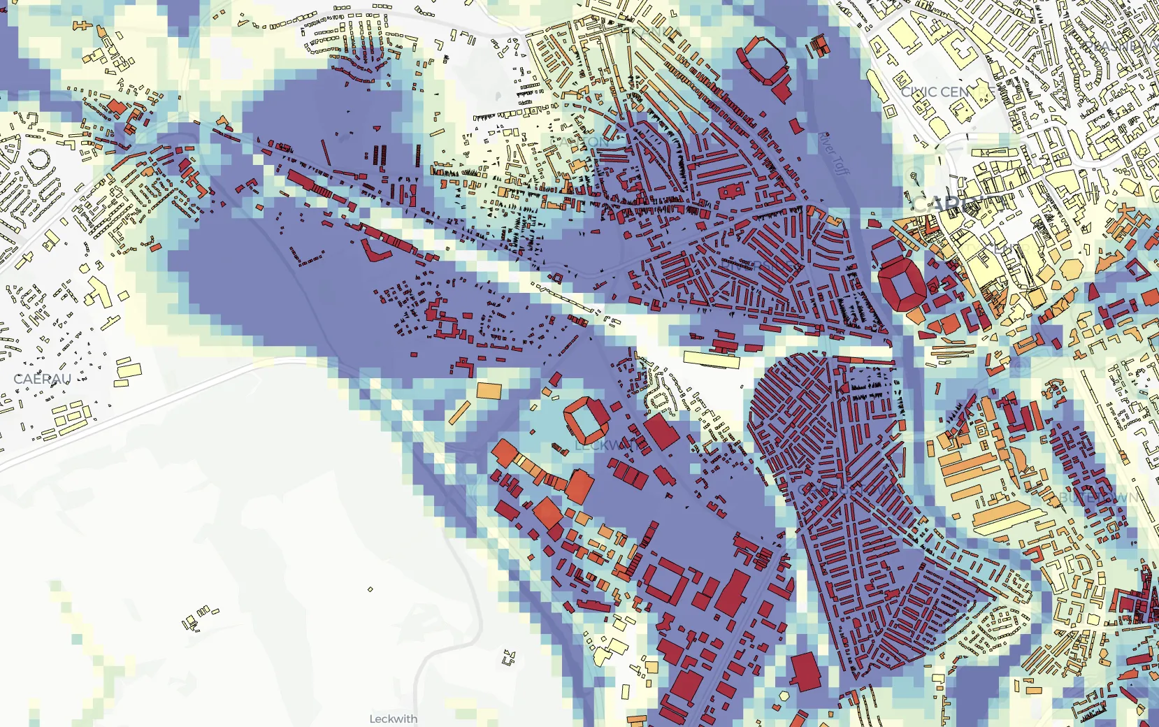 A map showing buildings overlaid with a gridded flood risk layer
