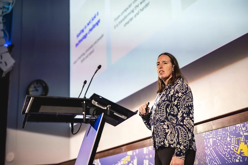 Head of Data at Ordnance Survey Debbie Wilson sharing their modernization journey for their geospatial stack